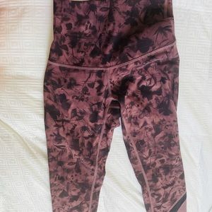 Woman’s size 2 purple and black Lululemon pants
